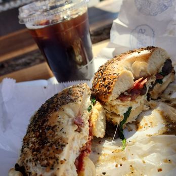 Spread Bagelry - Egg white sandwich on everything bagel with cold brew - Breakfast & Brunch Near Me - Cherry Hill, New Jersey