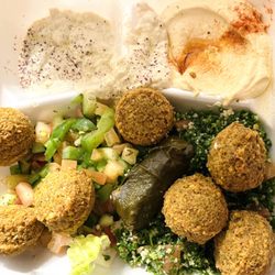Lazeez Mediterranean - vegetarian mezza plate with baba ghanouj, hummus, falafel, dolma, and tabbouleh
