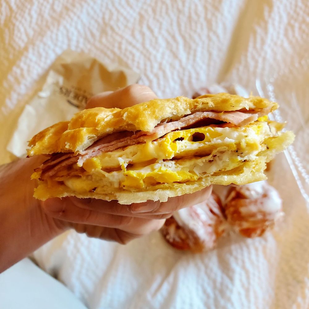 Kneaders Bakery & Cafe - Inside of a ham, egg, and cheese croissant - Bakeries Near Me - Provo, Utah Kneaders Bakery & Cafe - Inside of a ham, egg, and cheese croissant - Bakeries Near Me - Provo, Utah