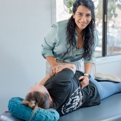 Well Adjusted OC - side posture chiropractic adjustment for low back pain