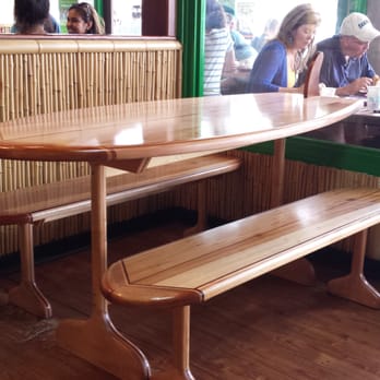 Coconuts Fish Cafe - Inside the restaurant they have cool "surfboard" shaped tables. - Seafood Near Me - Kihei, Hawaii Coconuts Fish Cafe - Inside the restaurant they have cool "surfboard" shaped tables. - Seafood Near Me - Kihei, Hawaii