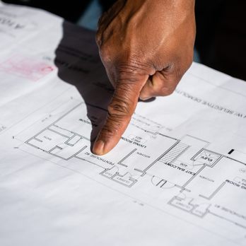 Fixit Construction - a hand pointing at a blueprint - General Contractors Near Me - Oakland, California Fixit Construction - a hand pointing at a blueprint - General Contractors Near Me - Oakland, California