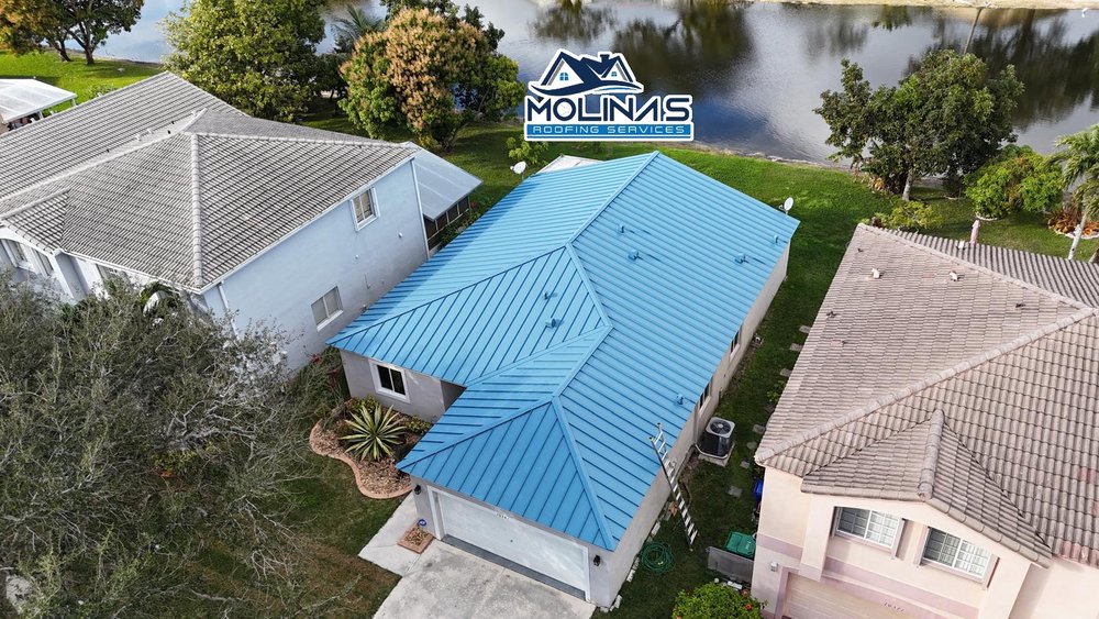 Slide of Molina's Roofing Services