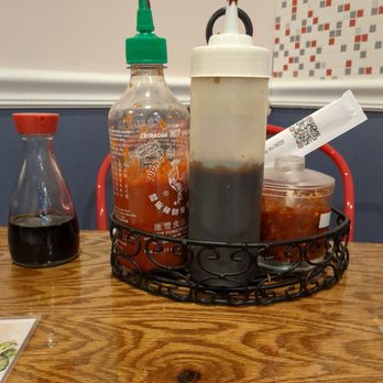 Oxtail Pho and Banh Mi - condiments on a table - Vietnamese Near Me - Galloway, New Jersey Oxtail Pho and Banh Mi - condiments on a table - Vietnamese Near Me - Galloway, New Jersey