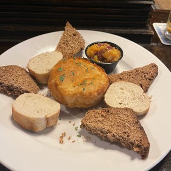 Conor O'neill's - Fried Brie Cheese with French Bread and Irish Sourdough served with Apple Peach Chuntney - Irish Near Me - Ann Arbor, Michigan Conor O'neill's - Fried Brie Cheese with French Bread and Irish Sourdough served with Apple Peach Chuntney - Irish Near Me - Ann Arbor, Michigan