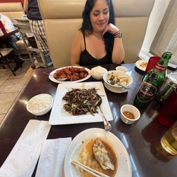 Mongolian beef, Orange chicken and pork wonton in chili sauce. Delicious!! Mongolian beef, Orange chicken and pork wonton in chili sauce. Delicious!!