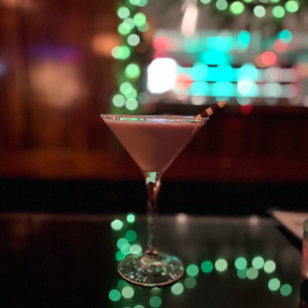 Blue Line Lounge & Grill - a martini on a table - Lounges Near Me - Chicago, Illinois