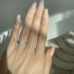 Kutie Kare Beauty and Spa - Gel x with pastel French tip manicure