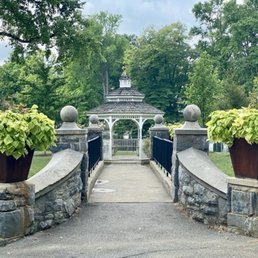 Bridge to the gazebo at the pond. Bridge to the gazebo at the pond.