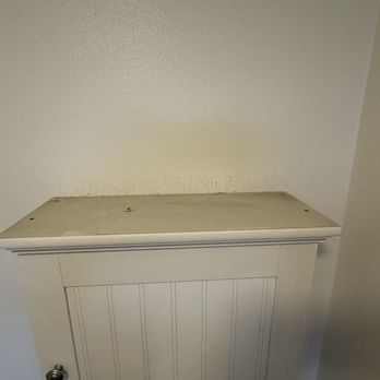 Pink Sponge Maids - This is the top of the cabinet in the bathroom that she has "finished" - Home Cleaning Near Me - Glendora, California