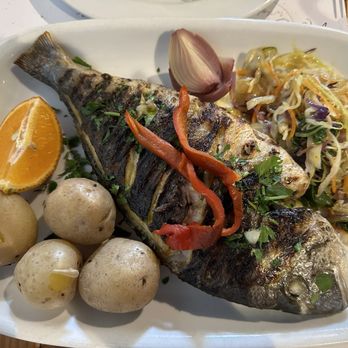 A Tasca - Grilled fish of the day which was Dorado for €20. Crispy skin outside and flaky inside. So fresh it tasted like chicken. - Mediterranean Near Me - Ponta Delgada, 20 A Tasca - Grilled fish of the day which was Dorado for €20. Crispy skin outside and flaky inside. So fresh it tasted like chicken. - Mediterranean Near Me - Ponta Delgada, 20