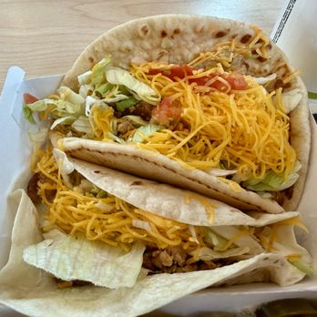Del Taco - Big Fat Grilled Chicken Taco on top. Regular Grilled Chicken Taco on bottom. - Tacos Near Me - Yukon, Oklahoma Del Taco - Big Fat Grilled Chicken Taco on top. Regular Grilled Chicken Taco on bottom. - Tacos Near Me - Yukon, Oklahoma