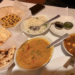 Vegetable korma, butter naan, paneer with onions and peppers in a spice gravy. gluten-free naan. Vegetable korma, butter naan, paneer with onions and peppers in a spice gravy. gluten-free naan.