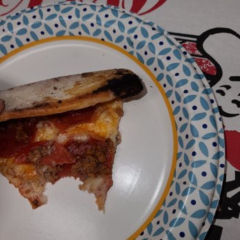 Steve's Pizza Express - Yes I took a bit but I noticed my hand had dirt and you can clearly see that it is burnt. - Italian Near Me - Cutler Bay, Florida