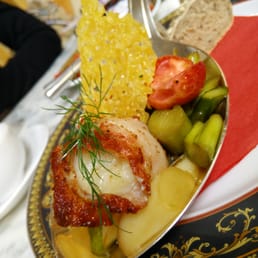 Bacon wrapped scallop with balsamic vinegar covered asparagus and strawberries