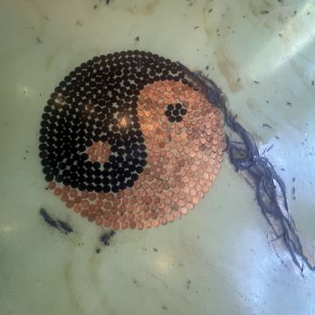 The Bubble Tea Place - Yin Yang sign on the floor made up of pennies - Bubble Tea Near Me - Victoria, British Columbia