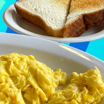 The Cracked Egg - a plate of toast and a plate of scrambled eggs - Breakfast & Brunch Near Me - Milliken, Colorado The Cracked Egg - a plate of toast and a plate of scrambled eggs - Breakfast & Brunch Near Me - Milliken, Colorado