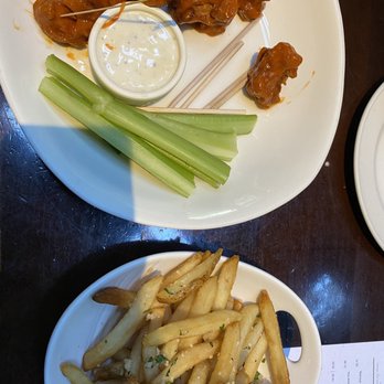 Yard House - Gardeint (R) Boneless Wings and truffle fries - New American Near Me - Seattle, Washington Yard House - Gardeint (R) Boneless Wings and truffle fries - New American Near Me - Seattle, Washington