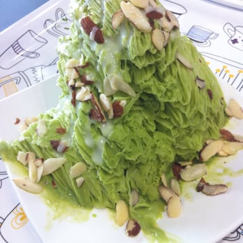 Nu Cafe - Green tea hill with sweetened condensed milk and almond slices. Yum!  Although I could have used more of the condensed milk. - Ice Cream & Frozen Yogurt Near Me - Houston, Texas