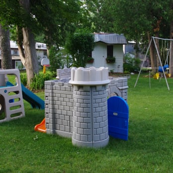 Pinedale Motor Inn - Children's play area surrounded by seating areas for adults. - Hotels Near Me - Grand Bend, Ontario Pinedale Motor Inn - Children's play area surrounded by seating areas for adults. - Hotels Near Me - Grand Bend, Ontario