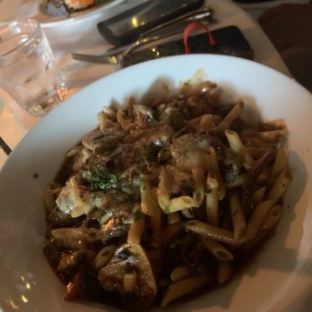The Left Bank - Penne w/ grilled steak "au poivre", tossed in a marsala wine sauce with wild mushrooms, roasted red onions, sweet peppers and asiago - New American Near Me - Buffalo, New York The Left Bank - Penne w/ grilled steak "au poivre", tossed in a marsala wine sauce with wild mushrooms, roasted red onions, sweet peppers and asiago - New American Near Me - Buffalo, New York