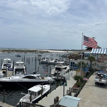 Tailfins Waterfront Grill - View top deck - Seafood Near Me - Destin, Florida Tailfins Waterfront Grill - View top deck - Seafood Near Me - Destin, Florida