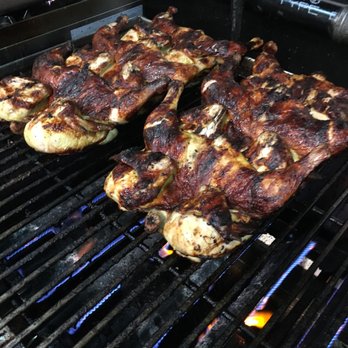 Chicken Ranch - chicken cooking on a grill - Chicken Shop Near Me - New York, New York Chicken Ranch - chicken cooking on a grill - Chicken Shop Near Me - New York, New York