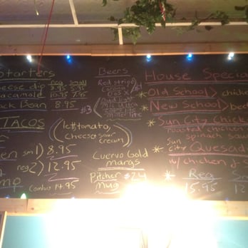 Sun City Cafe - The chalkboard menu! Matt (our server) says that they change it monthly to keep people guessing. - Mexican Near Me - Myrtle Beach, South Carolina