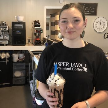 Jasper Java - a woman holding a cup of coffee - Coffee & Tea Near Me - Jasper, Texas Jasper Java - a woman holding a cup of coffee - Coffee & Tea Near Me - Jasper, Texas
