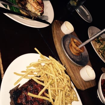 Yard House - St Louis ribs with fries, onion ring tower - Bars Near Me - Pasadena, California