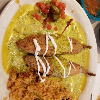 Chuy's - Jalapenos stuffed with meat and rice on side with signature sauce. - Tex-Mex Near Me - Humble, Texas Chuy's - Jalapenos stuffed with meat and rice on side with signature sauce. - Tex-Mex Near Me - Humble, Texas