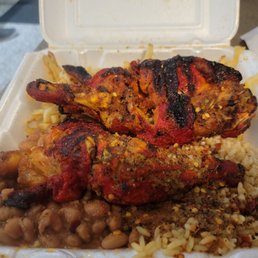 1/2 Dinos Famous Chicken