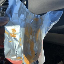a hand holding a piece of foil