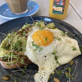 Drift Coffee & Kitchen - Mayfaire - Avocado toast with sunny side up egg. - Coffee & Tea Near Me - Wilmington, North Carolina