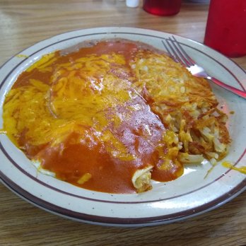 Cafe 66 - Huevos rancheros topped with red chile. - Mexican Near Me - Albuquerque, New Mexico