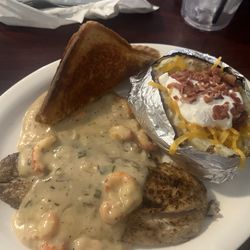 S & B Sports Bar & Grill - Blackened Red fish with crawfish cream sauce. Loaded baked potato, toast, and salad