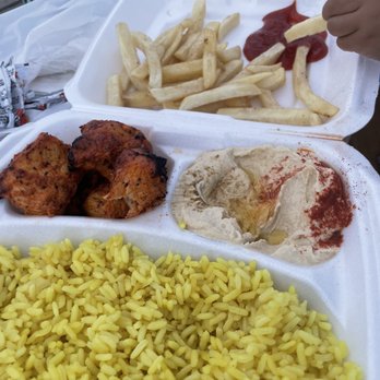 Mezzaterranean - Chicken plate with side of hummus. Added on fries and yogurt sauce. Total through yelp $24. Too much rice, not enough chicken. - Lebanese Near Me - Rancho Cucamonga, California