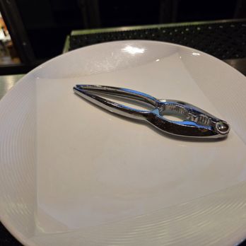 Anthony's Prime Steak & Seafood - Additional plate plus crab cracker suddenly appeared near me after I brought back crab legs on my plate - Steakhouses Near Me - Henderson, Nevada Anthony's Prime Steak & Seafood - Additional plate plus crab cracker suddenly appeared near me after I brought back crab legs on my plate - Steakhouses Near Me - Henderson, Nevada