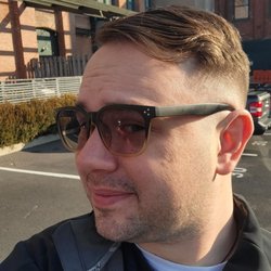 Philly Fades - Go see Nick! Warm, friendly, professional, and gives a great cut! Cash only and they have an atm.
