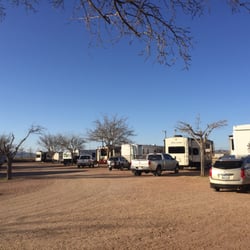 Southern Star Rv Park - Pull through RV spots, all on gravel, but level. Concrete "patio pad" for each.