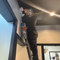 Jamul Pest Control - Commercial technician checking attic of a restaurant in San Diego, CA