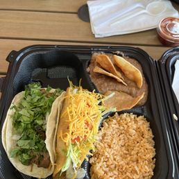 Chicken Taco, carnitas taco, beans and rice