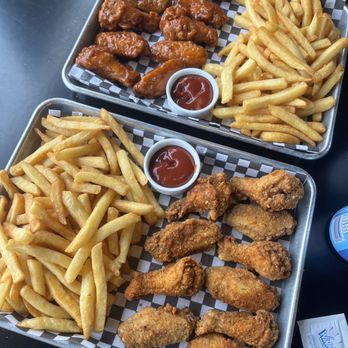6ixty Wings - two trays of chicken nuggies and fries - Chicken Wings Near Me - Mississauga, Ontario