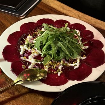 Main Street Steakhouse - Beef Carpaccio, not only plates beautifully but delicious. - Steakhouses Near Me - McAllen, Texas Main Street Steakhouse - Beef Carpaccio, not only plates beautifully but delicious. - Steakhouses Near Me - McAllen, Texas