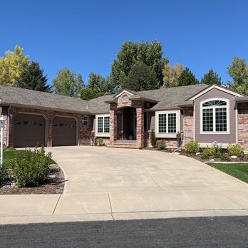 Schroeder Roofing - This home's roof perfectly complements its brick and siding exterior, providing reliable protection and seamless curb appeal. - Roofing Near Me - Loveland, Colorado Schroeder Roofing - This home's roof perfectly complements its brick and siding exterior, providing reliable protection and seamless curb appeal. - Roofing Near Me - Loveland, Colorado