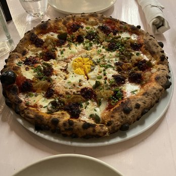 Bettina - Caramelized onion pizza with egg - Pizza Near Me - Santa Barbara, California Bettina - Caramelized onion pizza with egg - Pizza Near Me - Santa Barbara, California