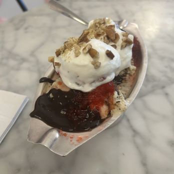 Aglamesis Brothers - Banana chocolate chip ice cream with cherry sauce and hot fudge - Chocolatiers & Shops Near Me - Cincinnati, Ohio