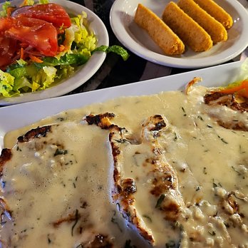 Aguardiente - Pechuga al Ajillo - $18.99 (chicken breast w garlic sauce) w 2 sides of choice - Steakhouses Near Me - Orlando, Florida