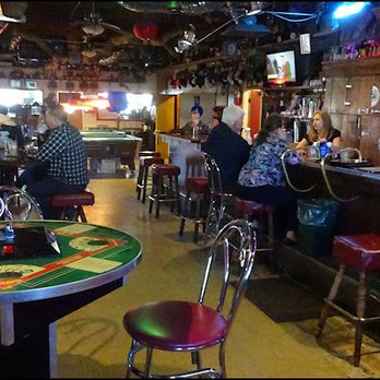 Loree's Little Shack - The main dining room, along with part of the very long bar, along with a gaming table in the foreground. - Diners Near Me - Rocklin, California