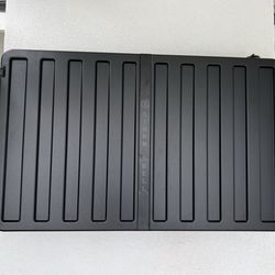 JR Mounting - 60" Storm Shield Mounted to outdoor brick fireplace.
